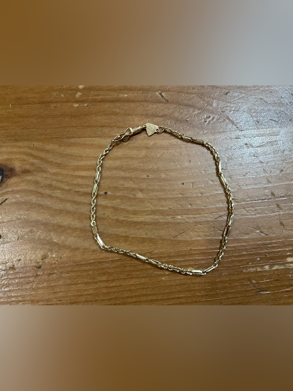 Beverly Hills Gold: 14k. Yellow gold twist rope n double link chain bracelet